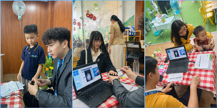 Chuyên gia sinh trắc vân tay Elite Symbol thao tác lấy mẫu trên máy quét chuyên dụng cho học sinh và phụ huynh